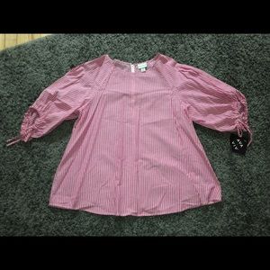 Pink, three quarter sleeve top.